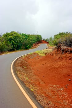 Gravel road waving across the mountains