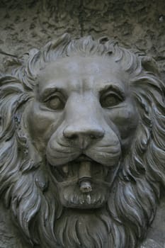 Lion head fountain showing unique design and details.