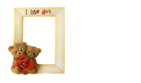 Two teddy bears with one heart sitting on the frame