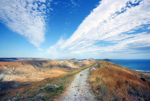 Two roads: cloud road in the sky and mount road on the ground