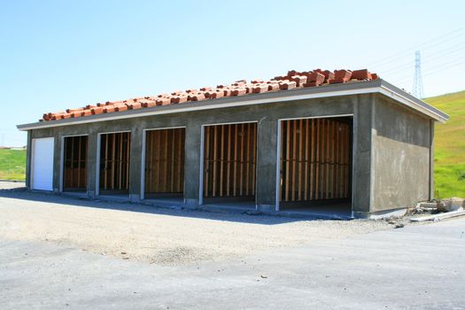 Close up of the garage building under construction.
