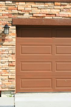 Close up of a garage entrance of a brand new house.
