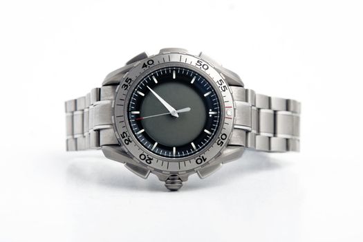 front view of silver watch on white background