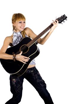 Pretty, blonde girl holding guitar, happy, laughing and playing music.