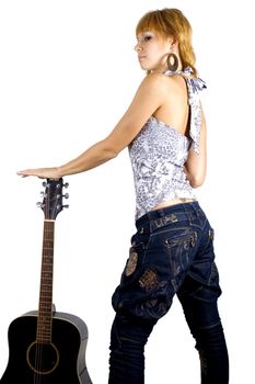 Pretty, blonde girl holding guitar, happy musician in country style.