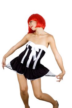 Red hair girl. Young, pretty female model. Naughty behaviour, wearing black skirt.