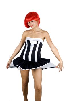 Red hair girl. Young, pretty female model. Naughty behaviour, wearing black skirt.