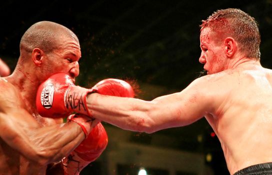 WBA interim welterweight belt holder Yuriy Nuzhnenko of Ukraine (R) throws a punch against Irving Garcia of Puerto Rico (WBA ranked #15) during their WBA World Welterweight Title fight in Kyiv, Saturday, April 19, 2008. The bout ended in a technical draw and Nuzhnenko retained his title. 