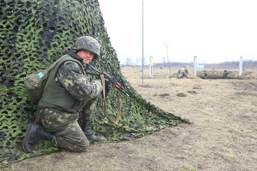 UkrPolBat Ukrainian-Polish battalion peacekeeper during the military exercises in Velykopolovetsk combined arms training area in Kyiv March 13, 2008. Ukraine