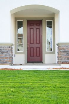 Close up of an entrance of a brand new house.
