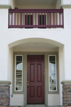 Close up of an entrance of a brand new house.
