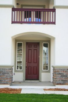 Close up of an entrance of a brand new house.
