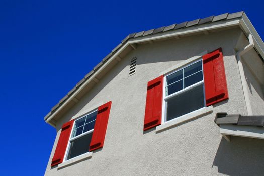 Close up of the windows of a house.
