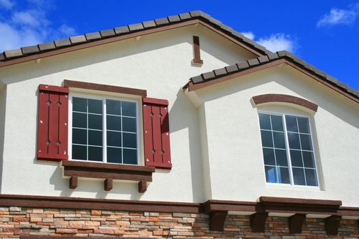 Close up of the windows of a house.
