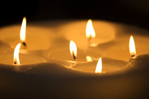 Some beautiful candles standing on the floor