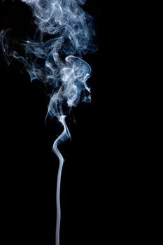 A stream of smoke slowly rising