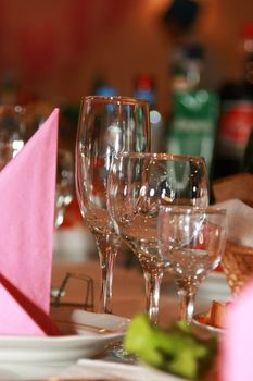 The served table with glasses for wine