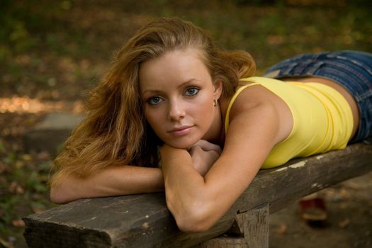 portrait of a redheaded girl in autumn 