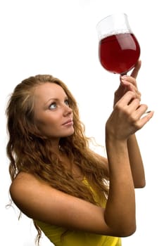 beautiful girl with a glass of wine on a light background