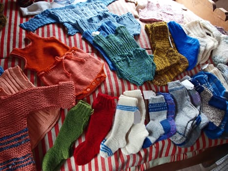 Handmade classic woven fashion items for children on display    