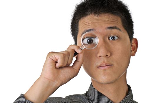 Young businessman watch and search on white background.