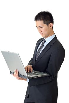 Young businessman use laptop on white background.