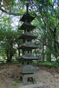 Close up of a japanese pagoda statue.

