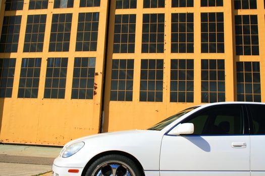 White Lexus GS with chrome rims and tinted windows.
