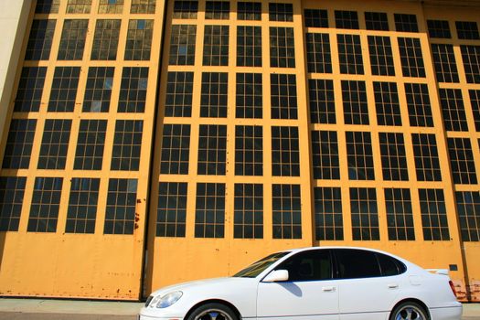 White Lexus GS with chrome rims and tinted windows.
