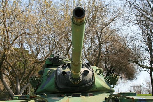 U.S. Military tank parked in a veterans memorial center.
