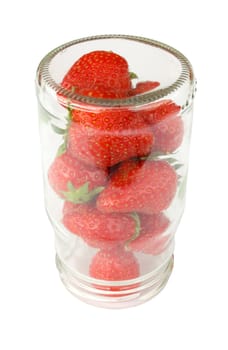 Strawberries in upset jar isolated on white background