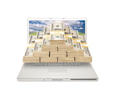 Silver Computer Laptop Isolated on White with Stacks of Hundred Dollar Bills Extruding the Screen.