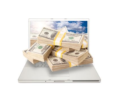 Silver Computer Laptop Isolated on White with Stacks of Hundred Dollar Bills Extruding the Screen.