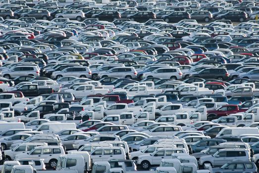 hundreds of new cars waiting for their owners