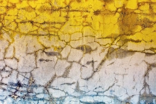 Old concrete wall with cracks - color illumination