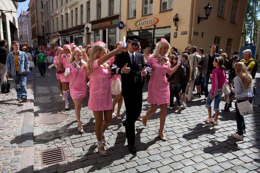 RIGA, LATVIA - MAY 29: The Latvian airline airBaltic team at Go Blonde parade Organized by the Latvian Association of Blonds in May 29, 2010, Riga.