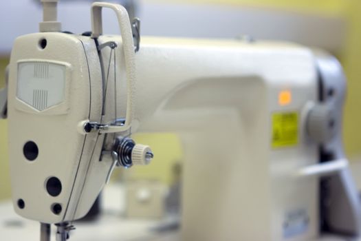 A sewing machine and on a table