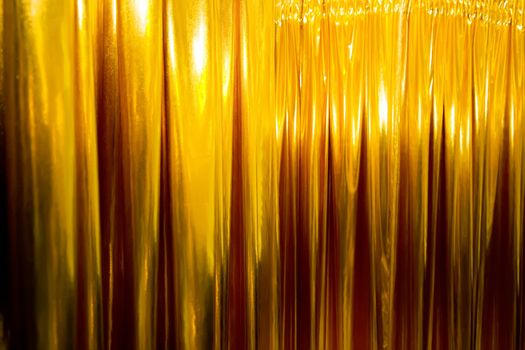 Golden curtains in the fitting room