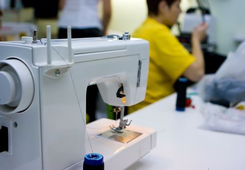 A sewing machine and on a table