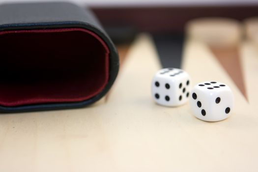 Two dices on backgammon board
