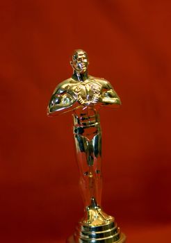 Gold oscar on red carpet