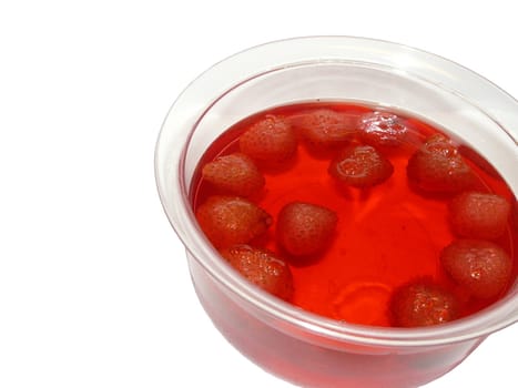 Jellied strawberries on the white background