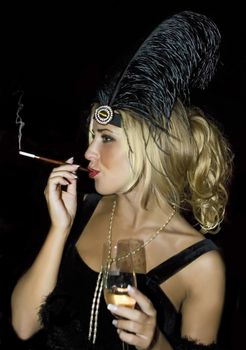 A beauty smoker with a glass of champaign and black colored feather