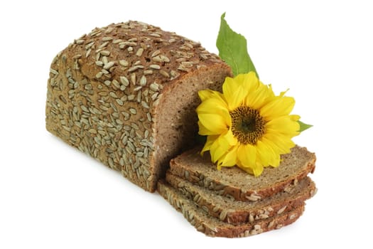 Sliced multi-grain-bread with sunflower blossom on white backgroud