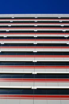 Close up of a modern building over blue sky.
