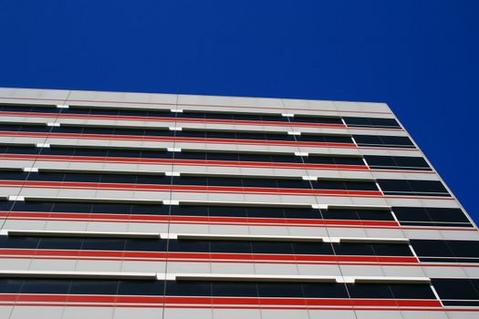 Close up of a modern building over blue sky.
