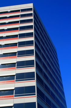 Close up of a modern building over blue sky.
