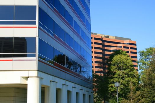 Close up of two modern buildings.
