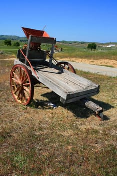 Close up of an old farm cart.
