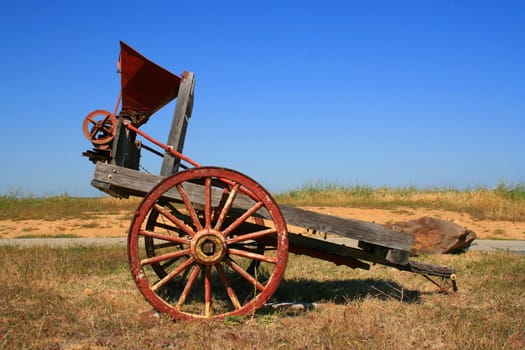 Close up of an old farm cart.
